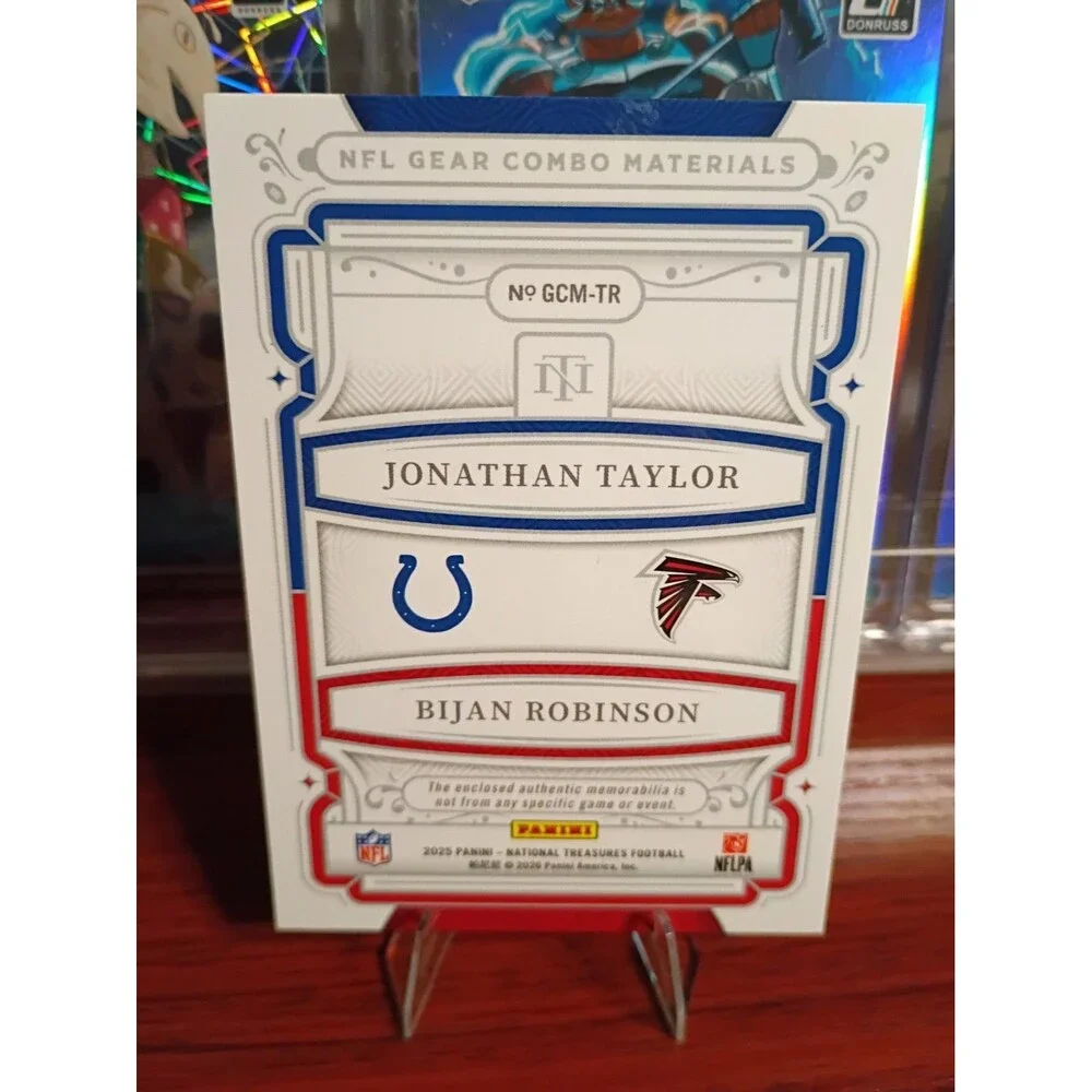 2025 Panini National Treasures - Nfl Gear Jonathan Taylor, Bijan Robinson 18/99